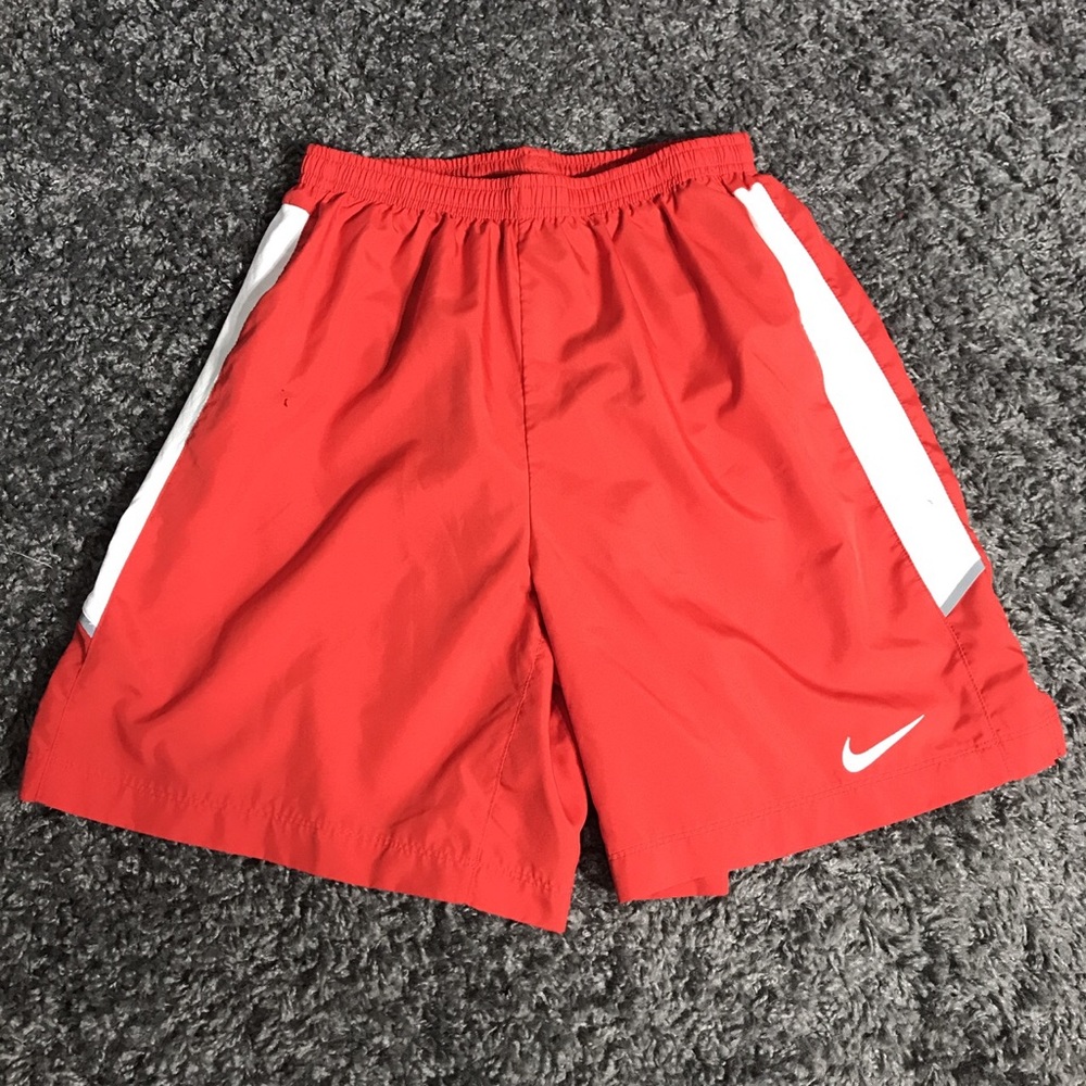 Red nike running shorts